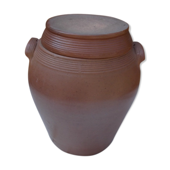 Old sandstone pot and its lid