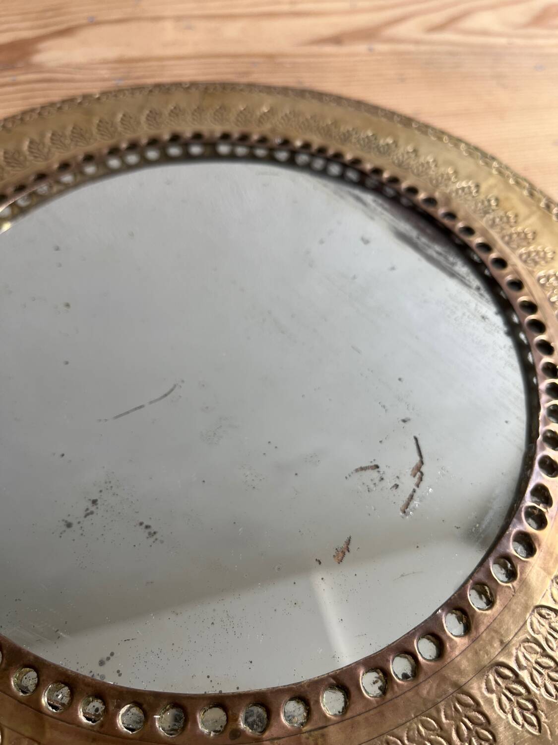 Round hammered brass mirror / vintage openwork