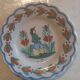 Two antique bowls signed HR from Quimper.