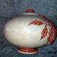 Large vase with relief plant decoration, raw art.