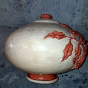 Large vase with relief plant decoration, raw art.