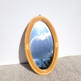 Oval rattan portrait mirror