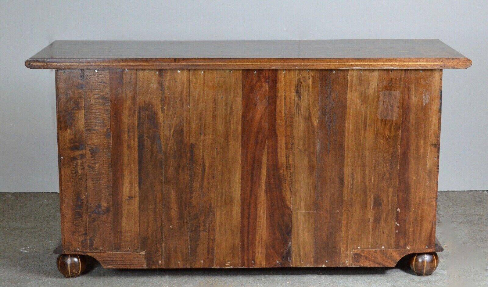 Rustic walnut sideboard with inlaid parquetry, vintage quality.