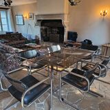 Dining table set with 6 Pieff chairs.
