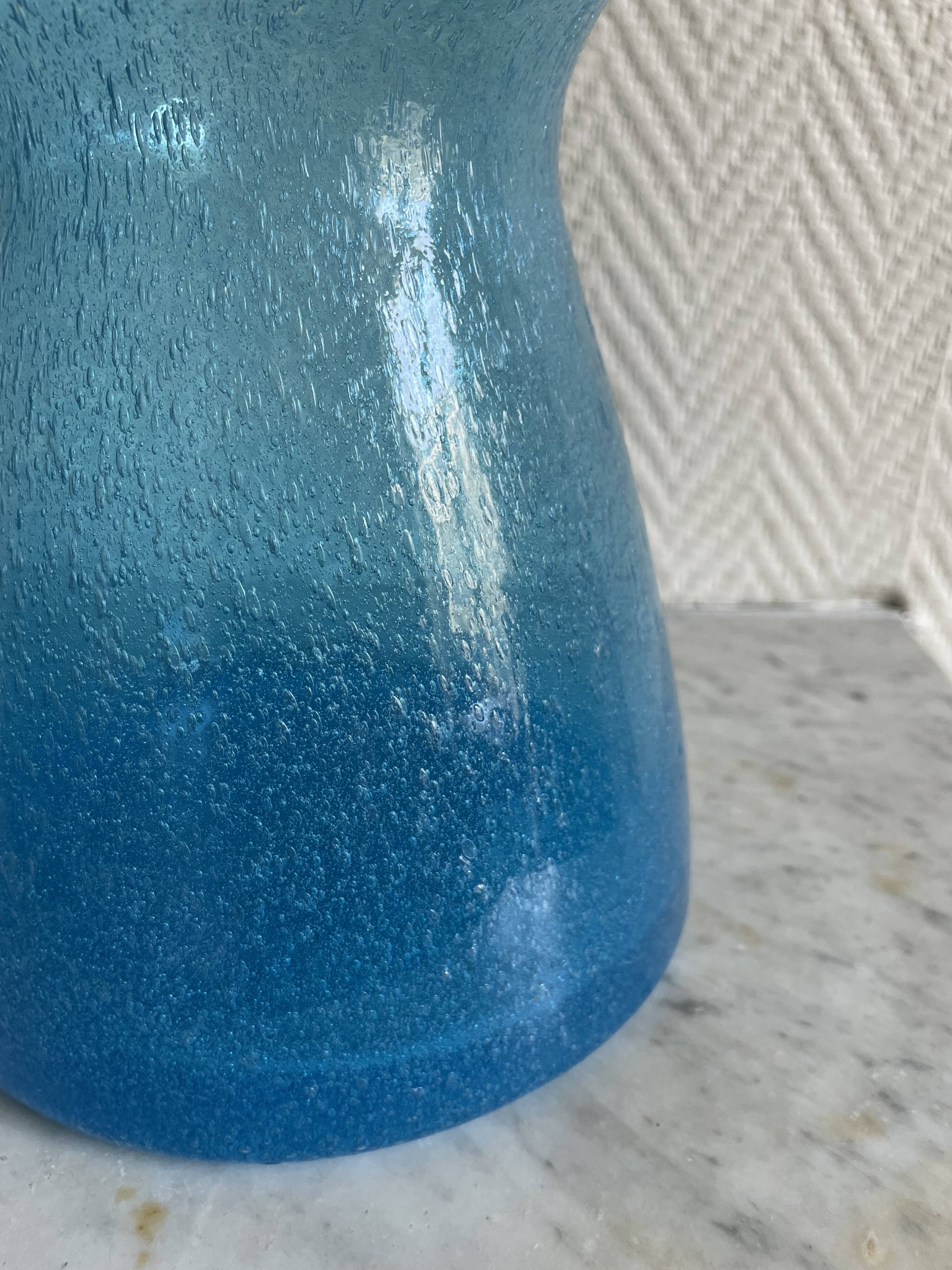 Blue glass vase with encrusted bubbles