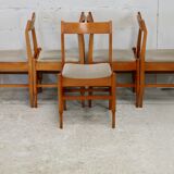 5 chaises en bois piètement fuselé circa 1975