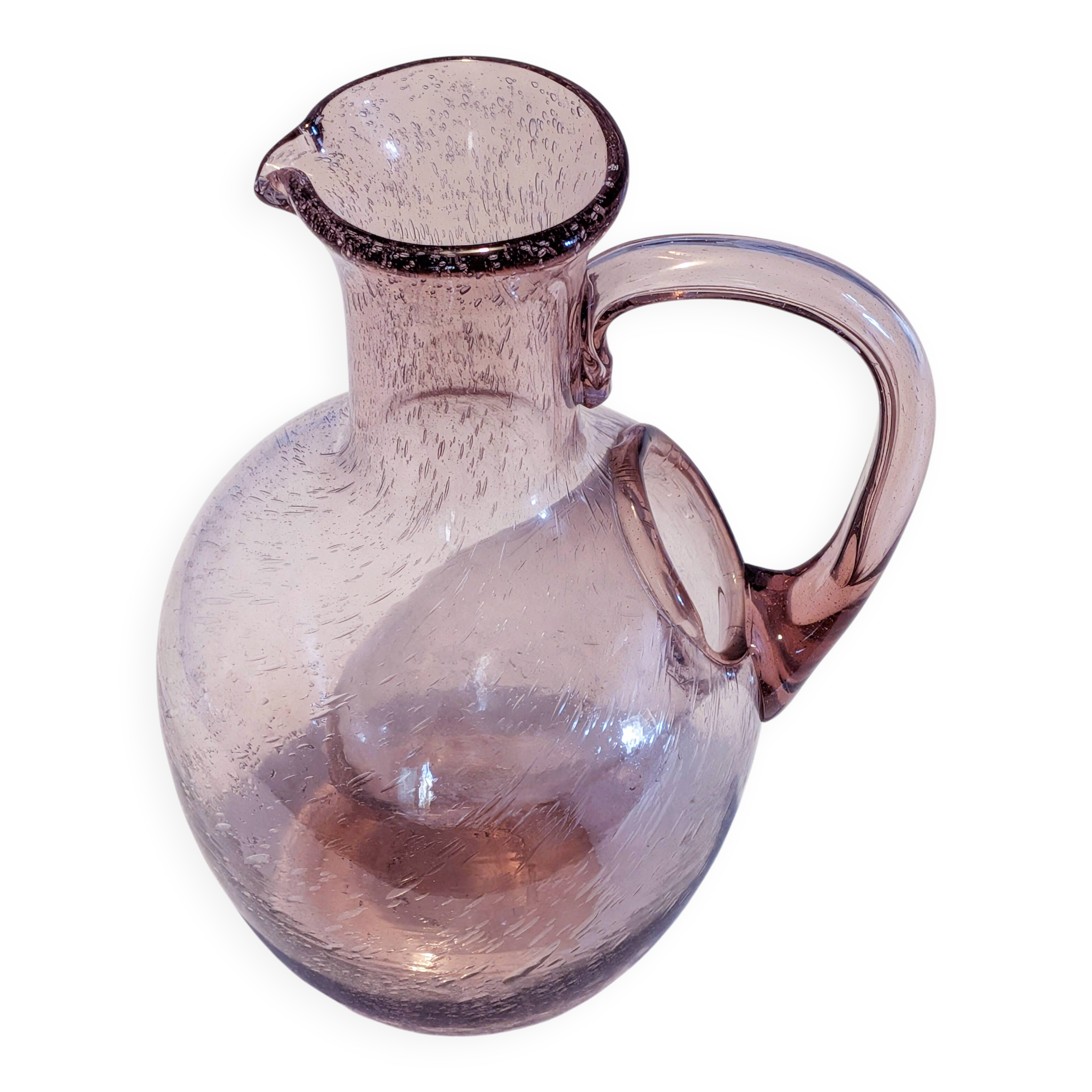 Large ice pitcher from Verrerie de Biot in amethyst bubble glass.