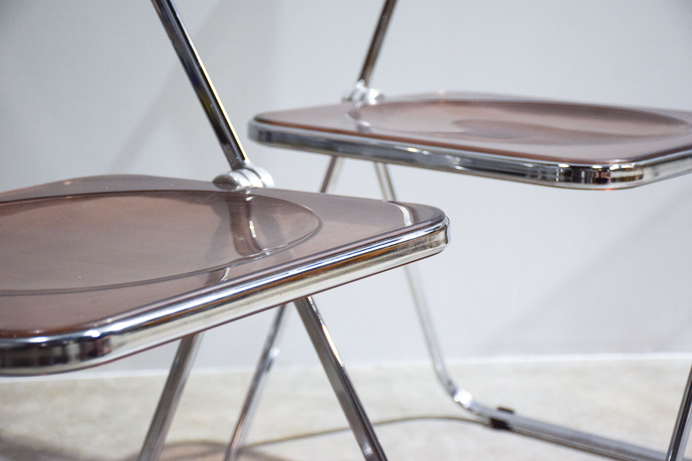 Set of eight pink Plia chairs by Giancarlo Piretti for Castelli