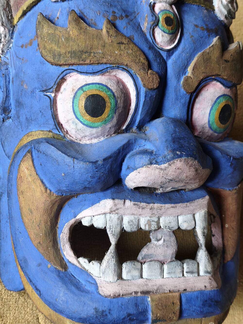 Ancient Balinese mask in polychrome carved wood – protective figure of the t