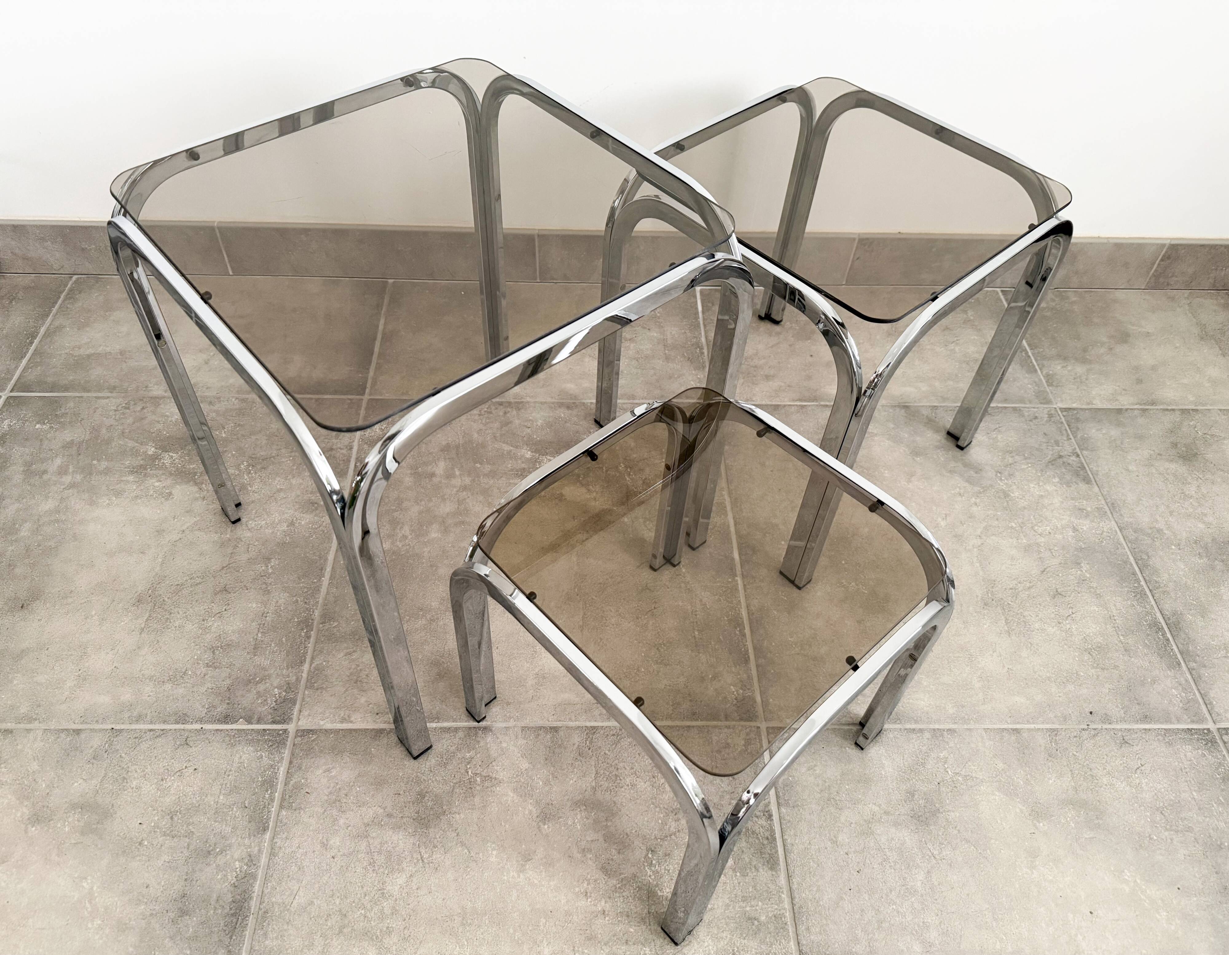Set of 3 nesting tables, chrome and smoked glass, 1970s.