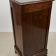 Small storage unit in solid wood and copper.