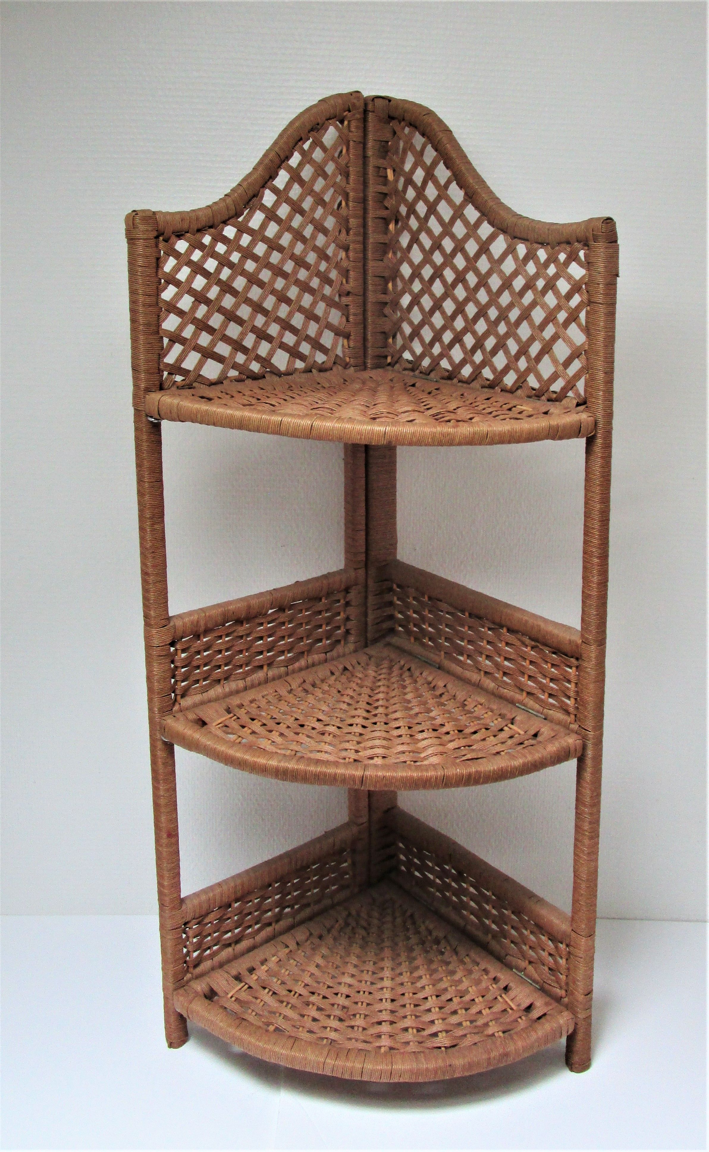 Corner shelf made of vintage braided natural fibers