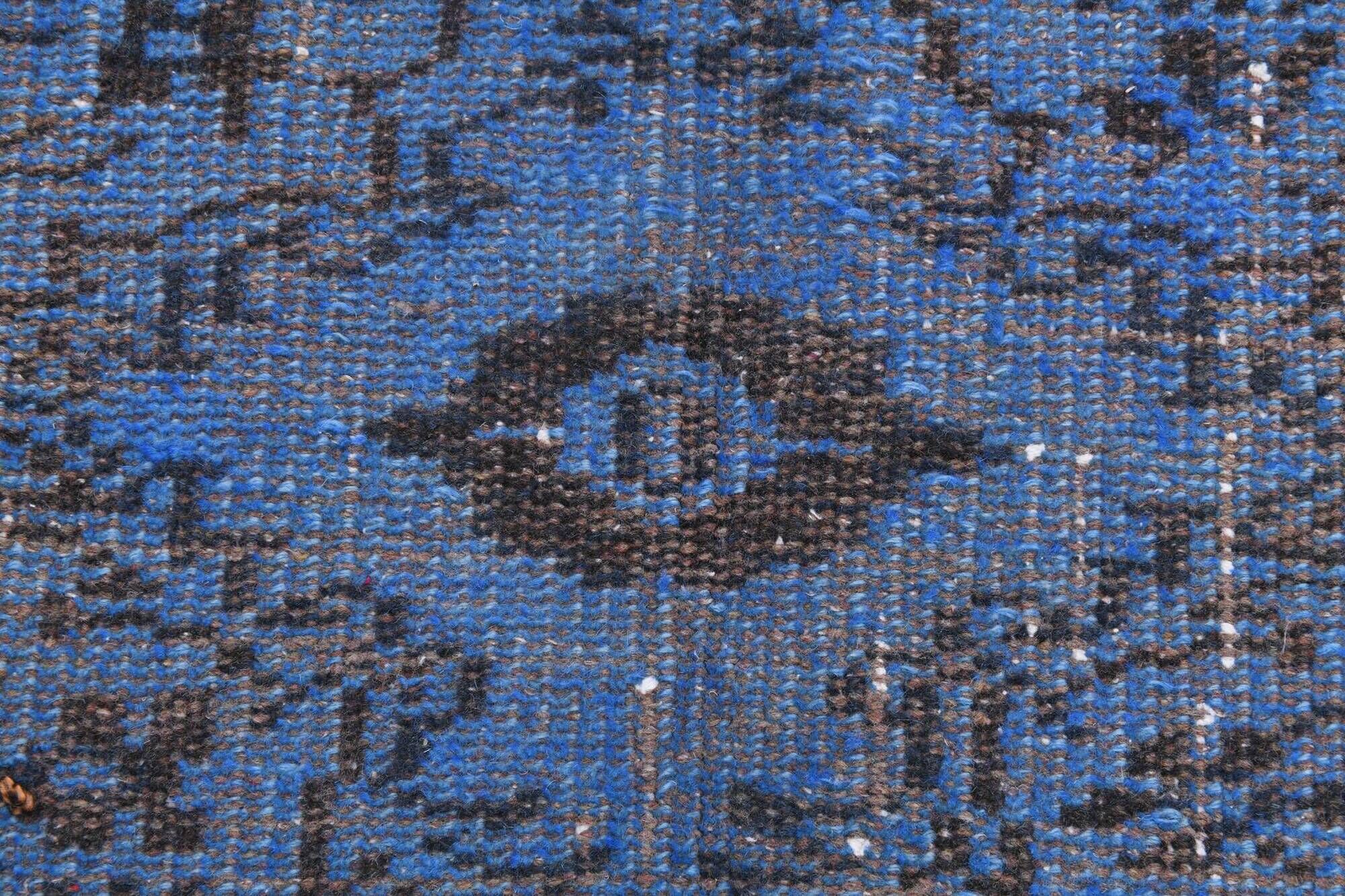 Vintage blue and black Turkish rug with traditional design, 163 × 268 cm