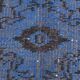 Vintage blue and black Turkish rug with traditional design, 163 × 268 cm