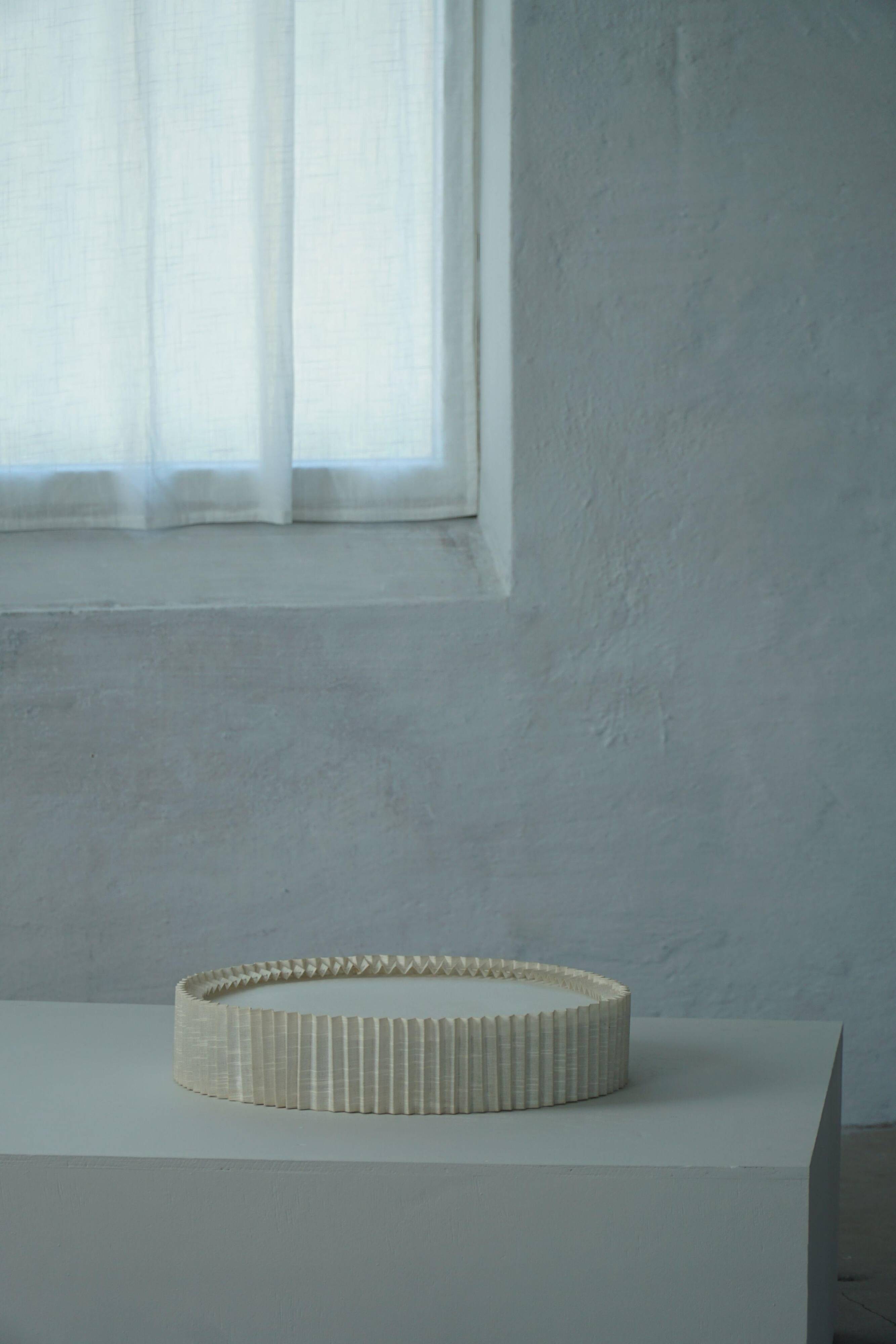 Modern mid-century ceiling/wall lamp from the 1950s in linen, made in Sweden.