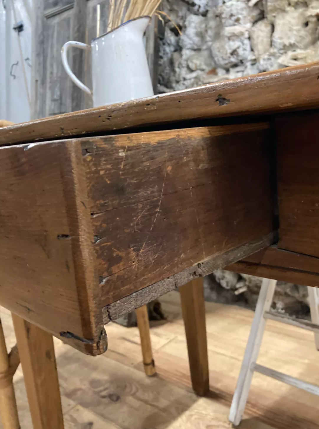 Rectangular wooden farmhouse table or rustic desk with antique drawer