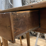 Rectangular wooden farmhouse table or rustic desk with antique drawer