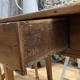 Rectangular wooden farmhouse table or rustic desk with antique drawer