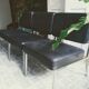 3 black armchairs