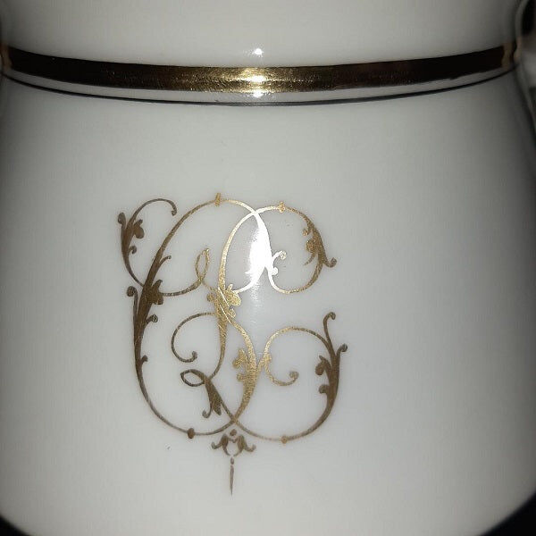 Porcelain sweetener and milk jug with cipher