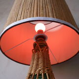 Lamp in glass and woven rattan