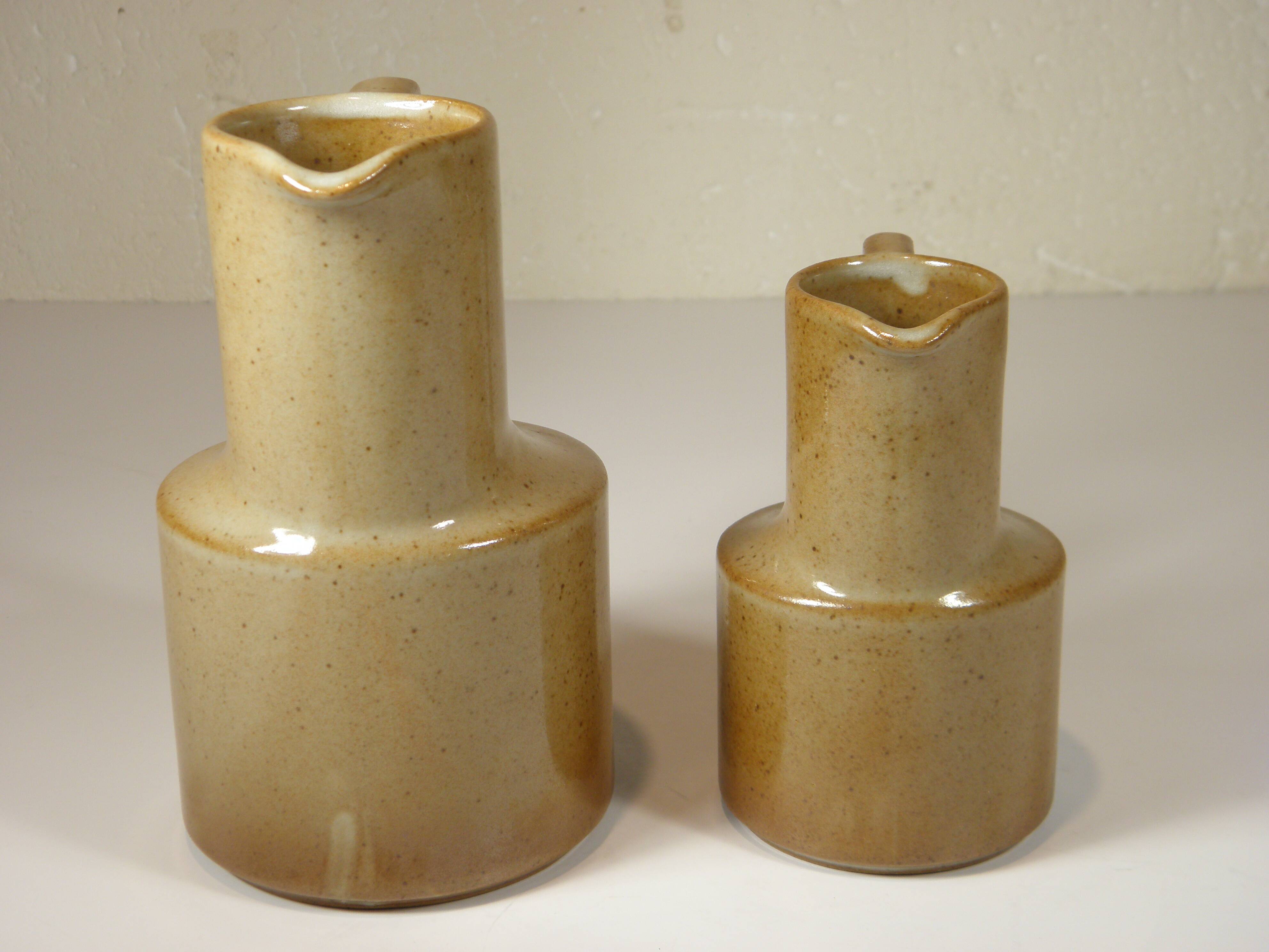 TWO STONEWARE jugs from Brenne