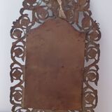 19th century beveled mirror with metal decor
