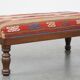 Oriental pouf upholstered in an antique kilim