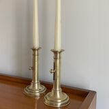 Pair of antique brass push candlesticks