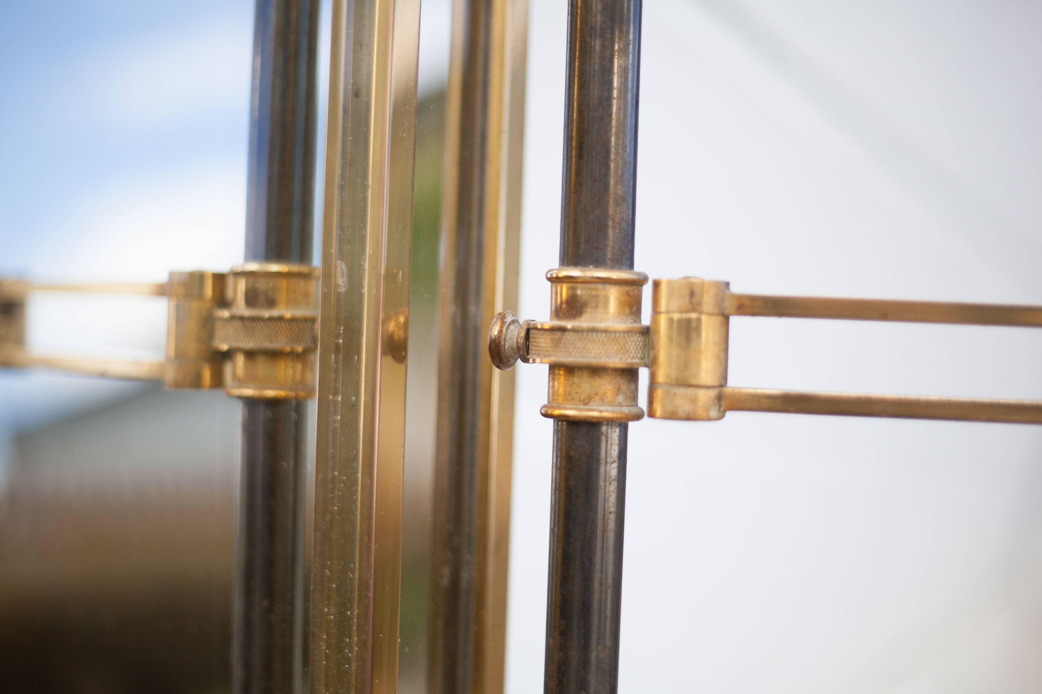 mirror with articulated wall light