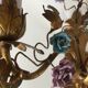 Two bronze wall light decorated with flowers in german porcelain