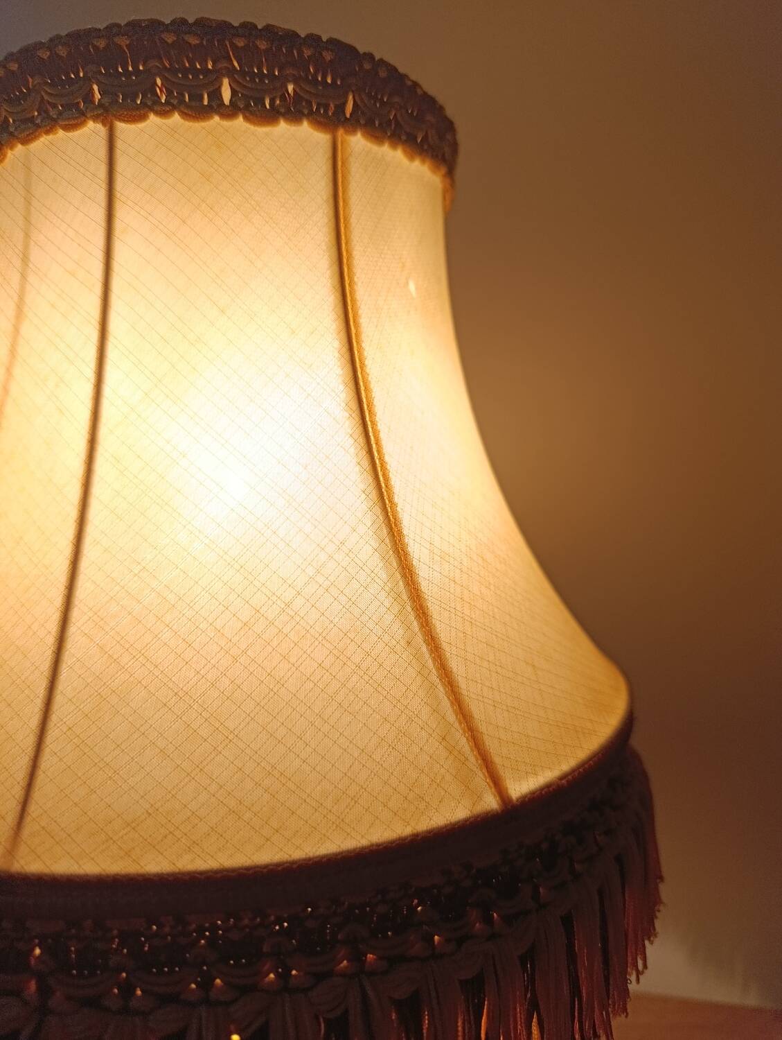 Chic retro lamp with a bronze pagoda fringe shade, 1950.