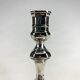 Pair of antique candlesticks in silver metal