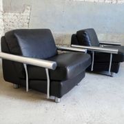 pair of armchairs, black leather & stainless steel, 1990