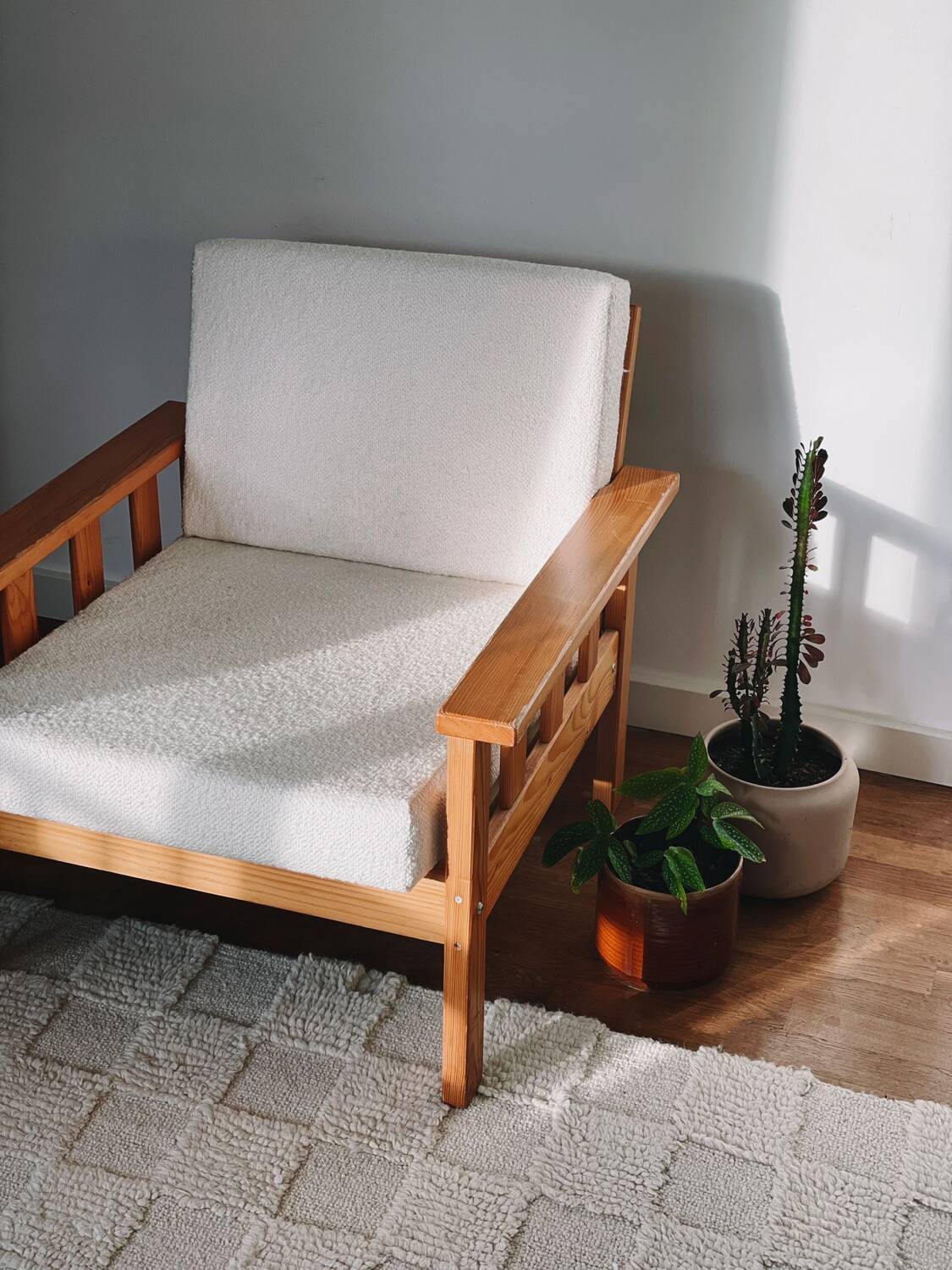 Brutalist armchair in wood and bouclé fabric