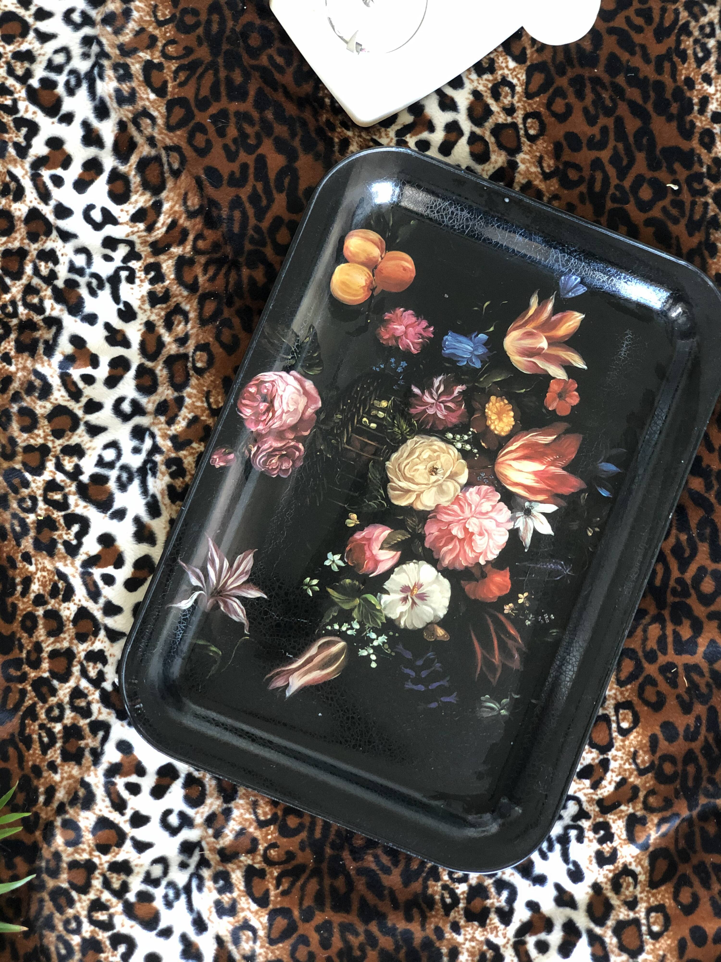 Black tray with floral motifs