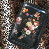 Black tray with floral motifs