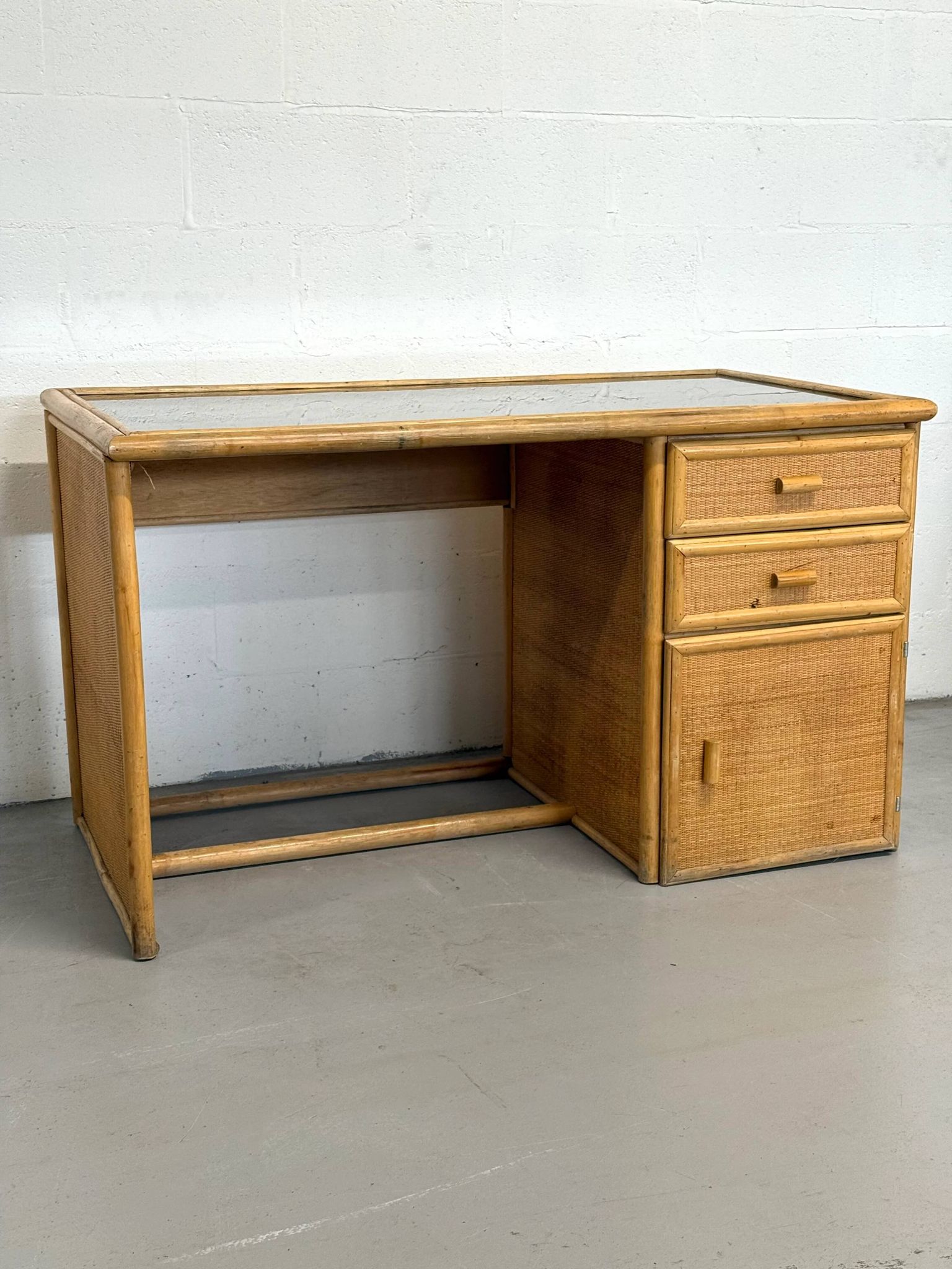 Vintage bamboo and woven rattan desk — glass top