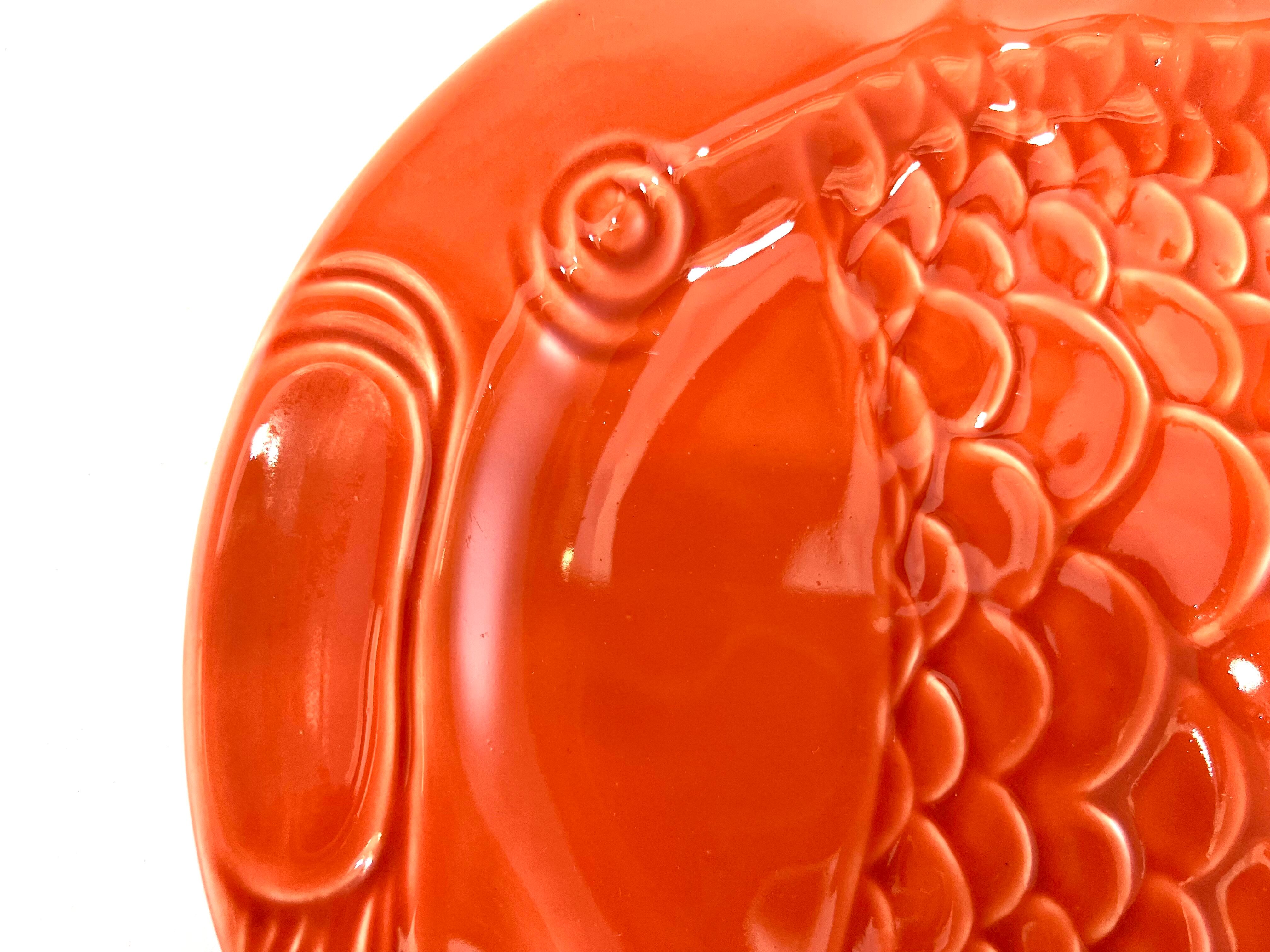 Orange fish dish Christian Dior