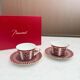 Pair of Baccarat Porcelain Coffee Cups and Saucers, Red Geometric Design