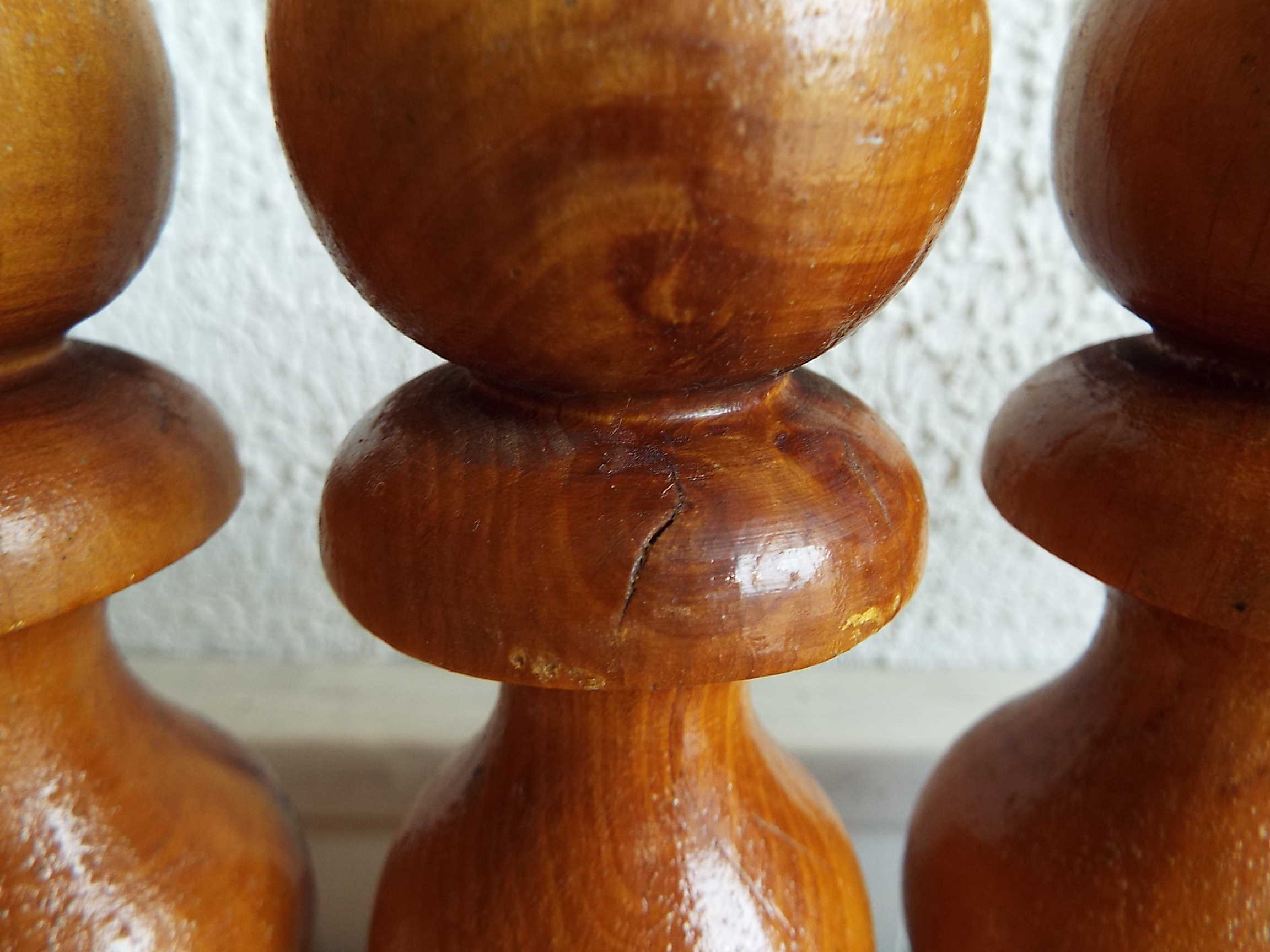 Set of 9 turned wooden pins