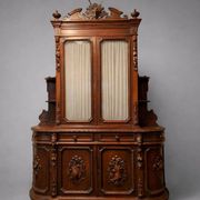 Important two-body buffet from a hunting lodge in carved walnut, Renaissance style.