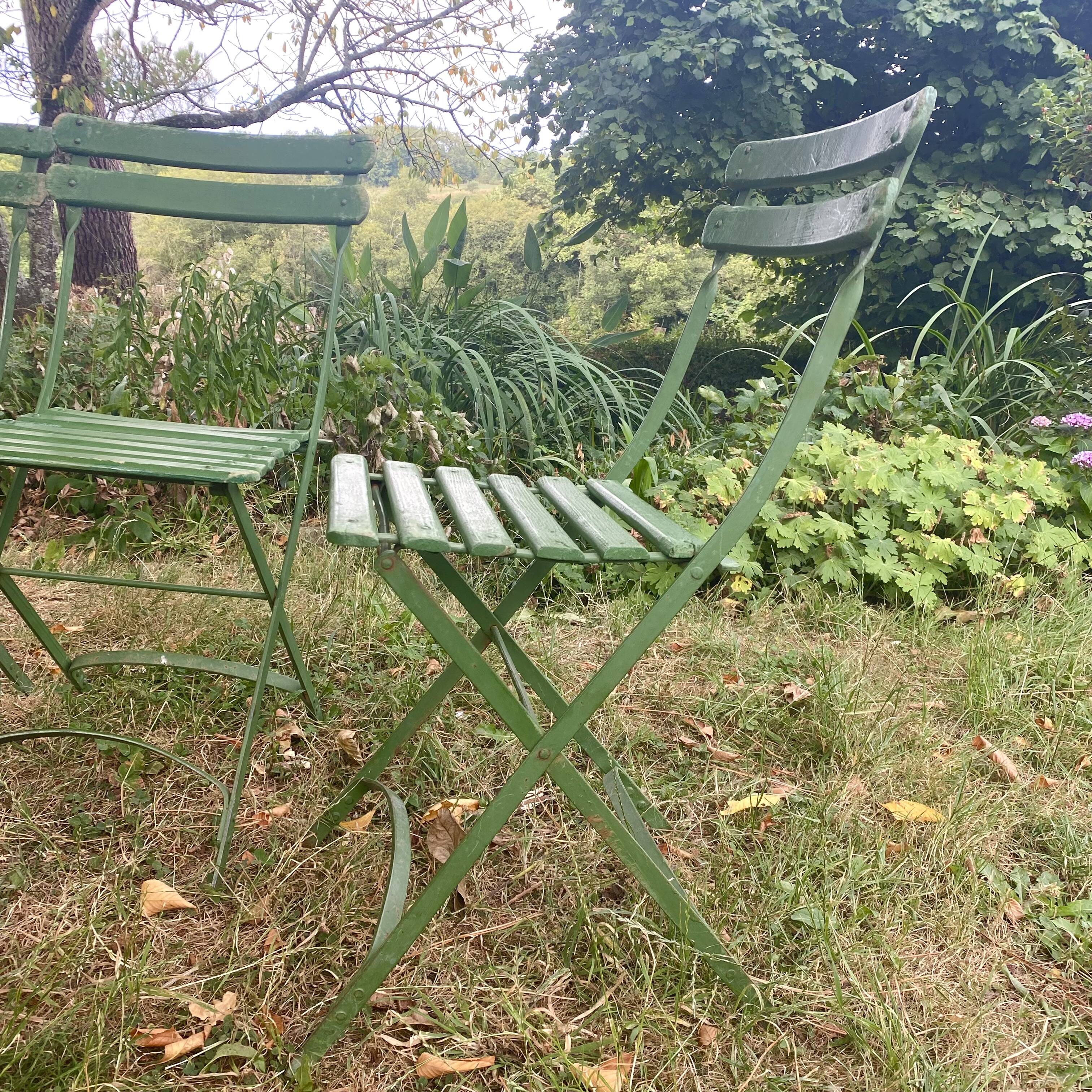 Antique folding garden chairs with wooden slats