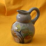 Ceramic pitcher by simone larrieu.