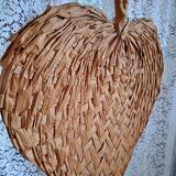 Heart fan in vintage woven palm leaves