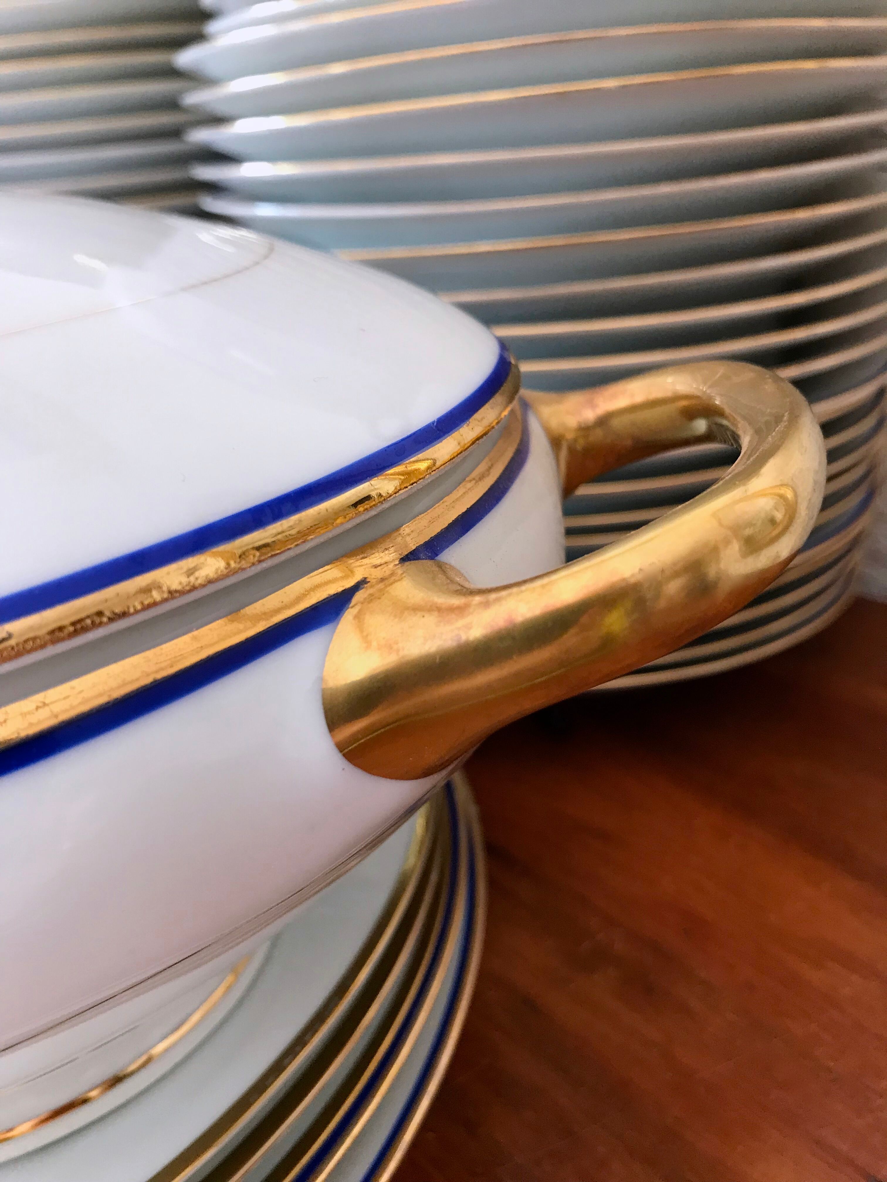 table service art deco limoges porcelain white border blue and gold 61 pieces signed