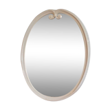 Oval mirror patinated white enamelled metal frame