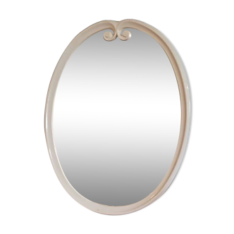 Oval mirror patinated white enamelled metal frame