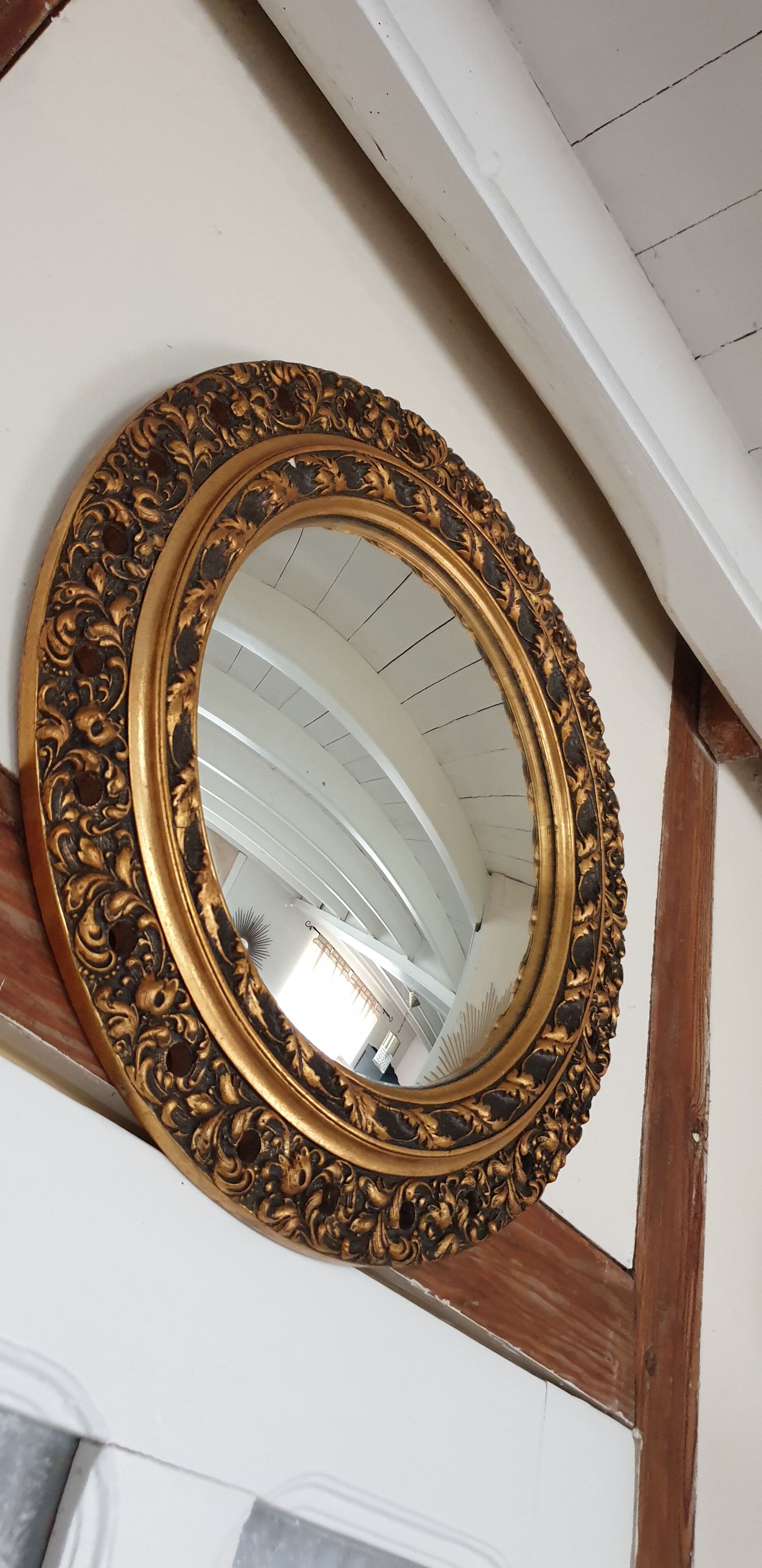Carved golden witch mirror