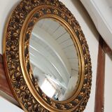 Carved golden witch mirror